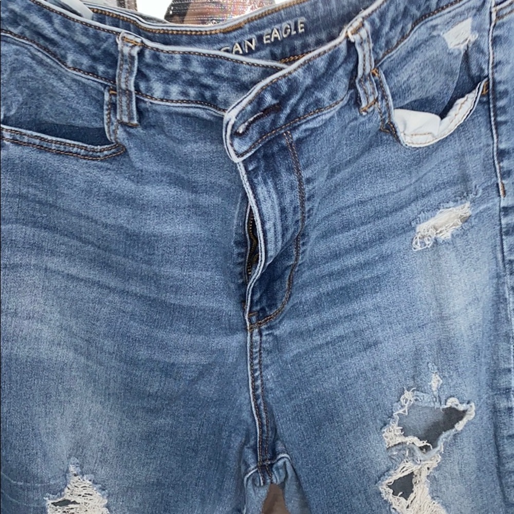 ripped high rise jeans